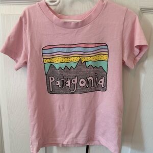 Patagonia Pink Short Sleeve Tee with Graphic Design